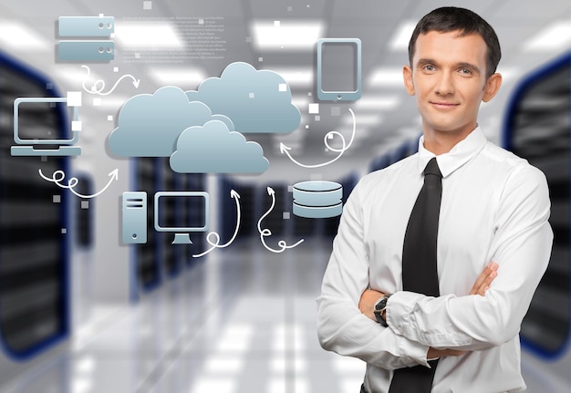 Cloud engineering is crucial for modern businesses, illustrated by an IT professional managing cloud infrastructure and connected digital systems in a data center.